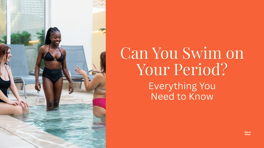 Can you swim on your period - woman diving confidently into a sunlit pool - Savvi Wear