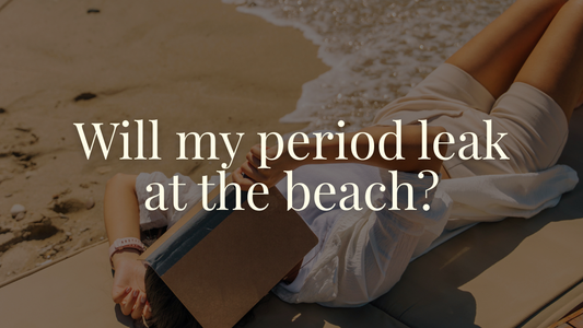 Period swimwear - woman lying down at the sandy beach - Savvi Wear